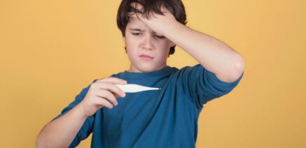 child with thermometer